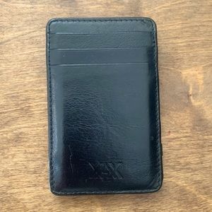 Lightly used black leather wallet.